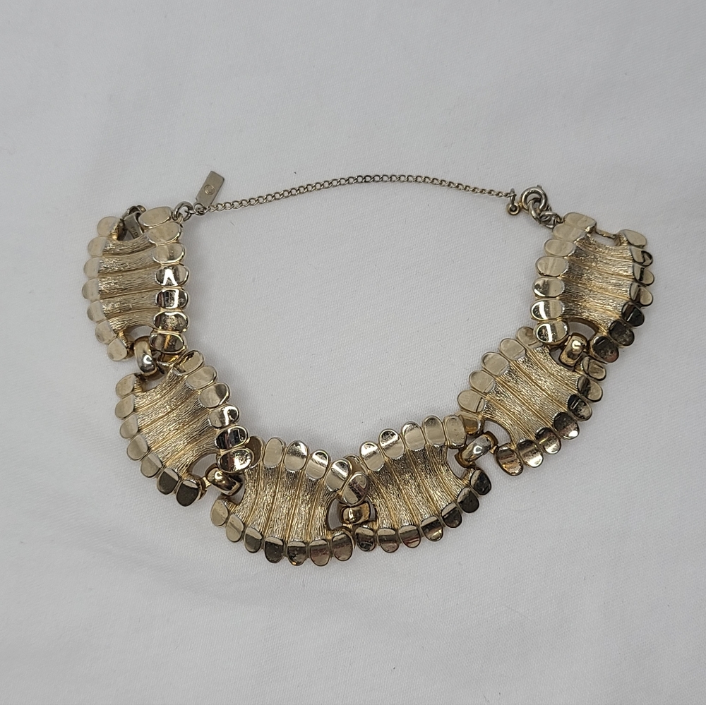 Vintage Monet Gold Tone 6 Panel Etched Flower Linked Bracelet w/ safety chain